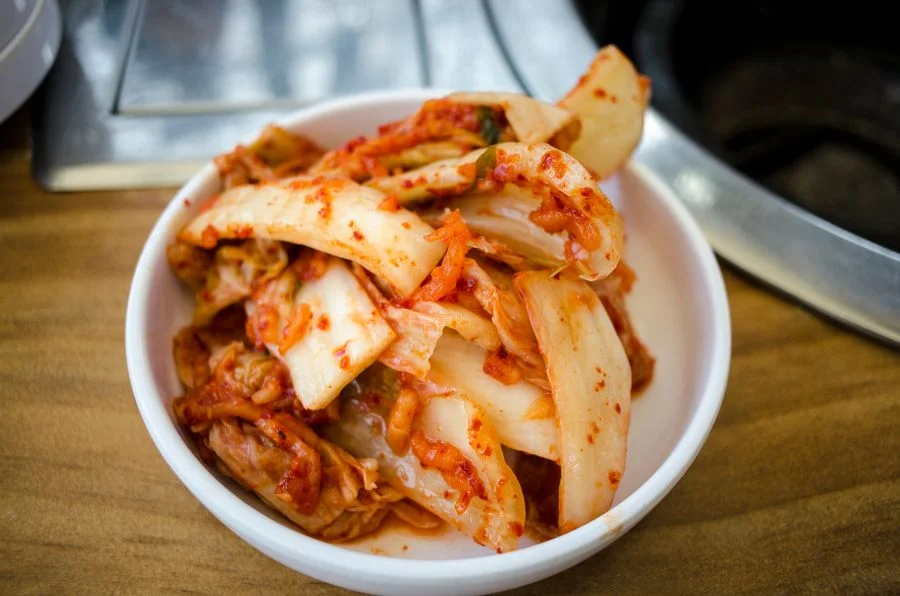Freshly prepared kimchi in a ceramic bowl