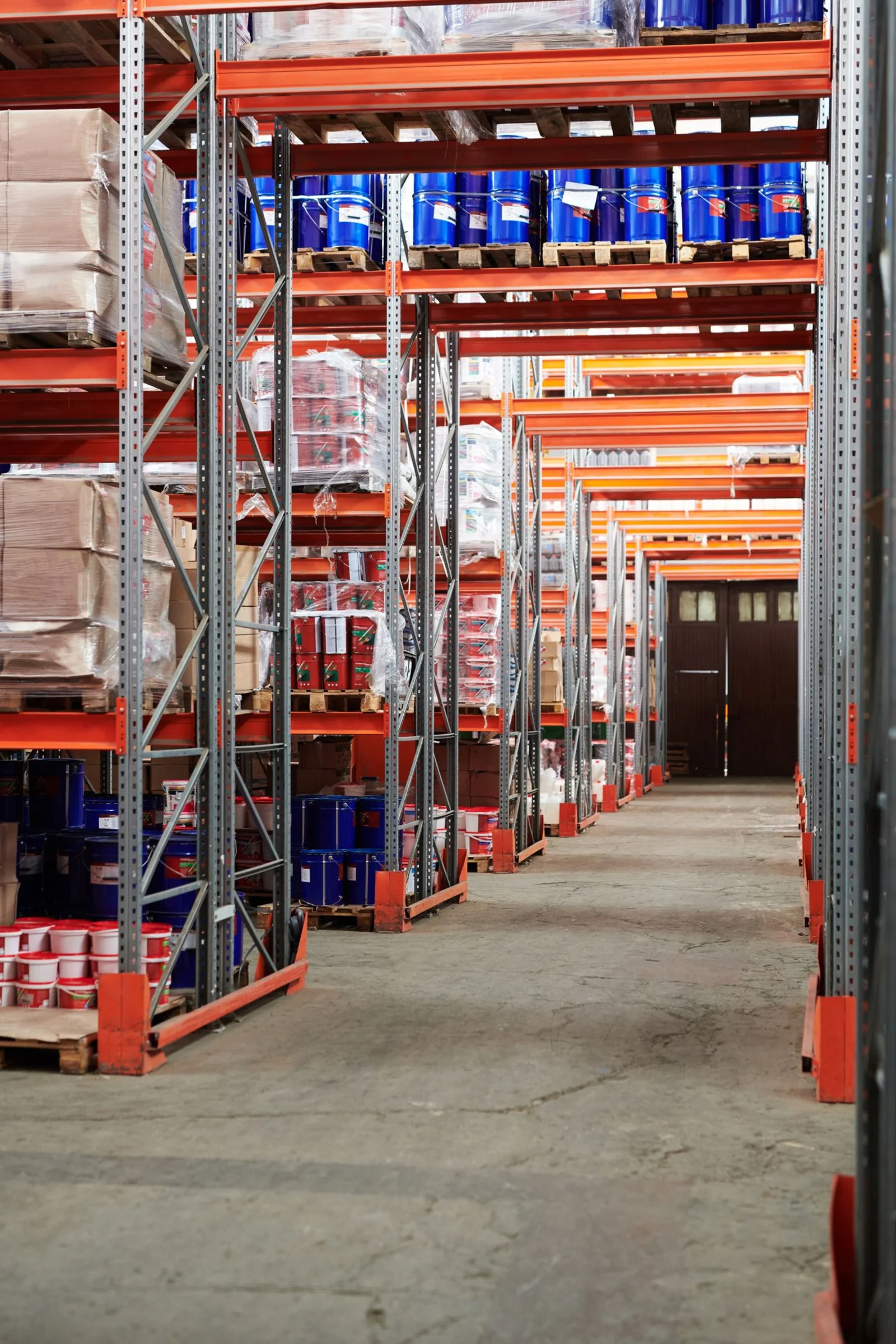 Tall warehouse racks stocked with pallets